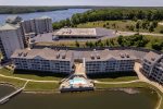 DRONE VIEW OF CONDO COMPLEX AND POOL
